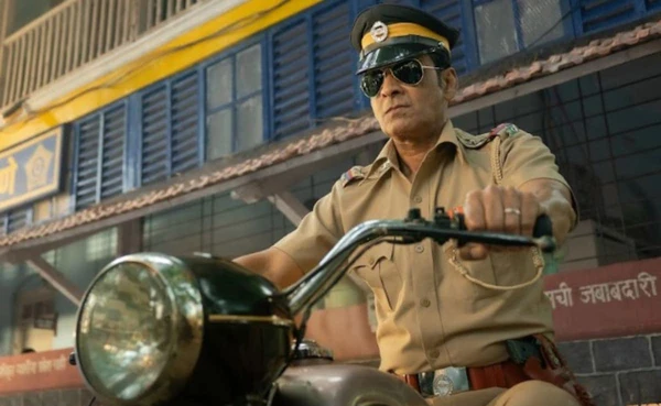 Inspector Zende rides a motorcycle, ready for action in "Inspector Zende".