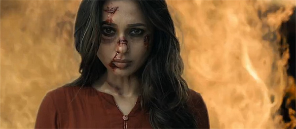A bloodied sister looks determined in the suspenseful series "Dainee".